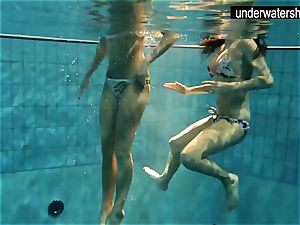 two handsome amateurs flashing their figures off under water